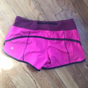 Lululemon pink / purple speed up shorts Sz 2
